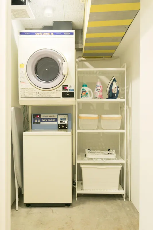 Laundry room with a washing machine and a dryer