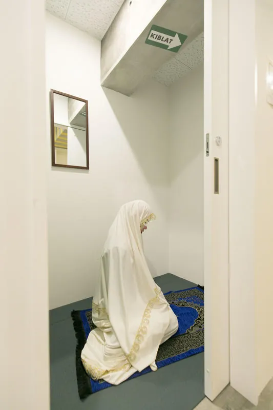 Small prayer room with a prayer mat
